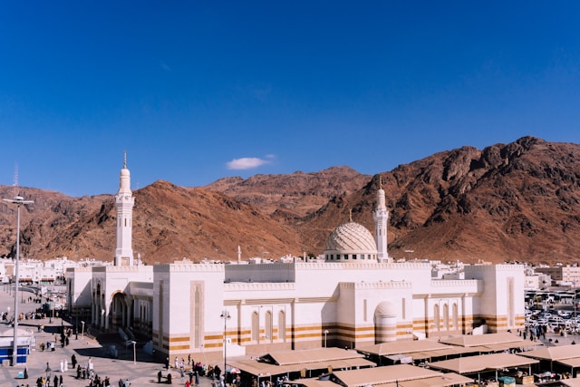 Glistening Marble of the Grand Mosque and the Verdant Domes of Medina: Spiritual Landscapes