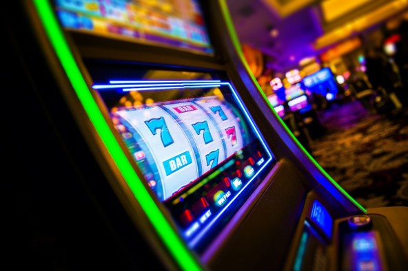What's the difference between Slots and table games?